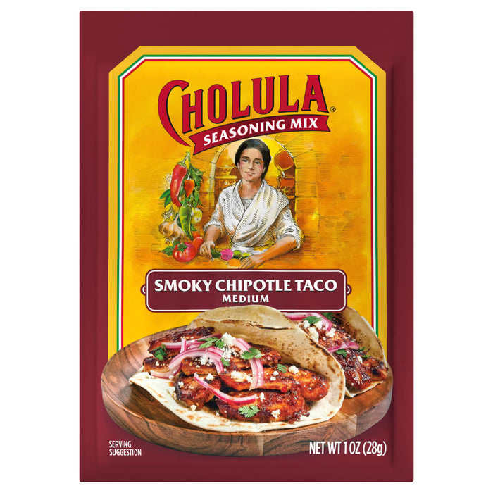 A package of Cholula Smoky Chipotle Taco seasoning mix with a serving suggestion of a taco on a wooden plate.
