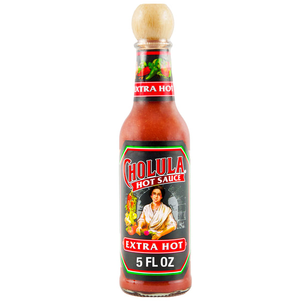 A bottle of Cholula Extra Hot Hot Sauce.