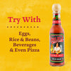 A bottle of Cholula Extra Hot sauce with a yellow background and text that says Try With: Eggs, Rice &amp; Beans, Beverages &amp; Even Pizza.