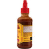 A bottle of Cholula hot sauce with a red cap and a label showing nutrition facts and ingredients.