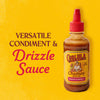 A bottle of Cholula Chamoy Sauce, a versatile condiment and drizzle sauce that is sweet and spicy.