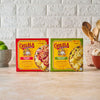Two boxes of Goya rice mix, one red and one green, are displayed on a countertop.