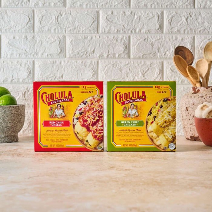 Two boxes of Goya rice mix, one red and one green, are displayed on a countertop.