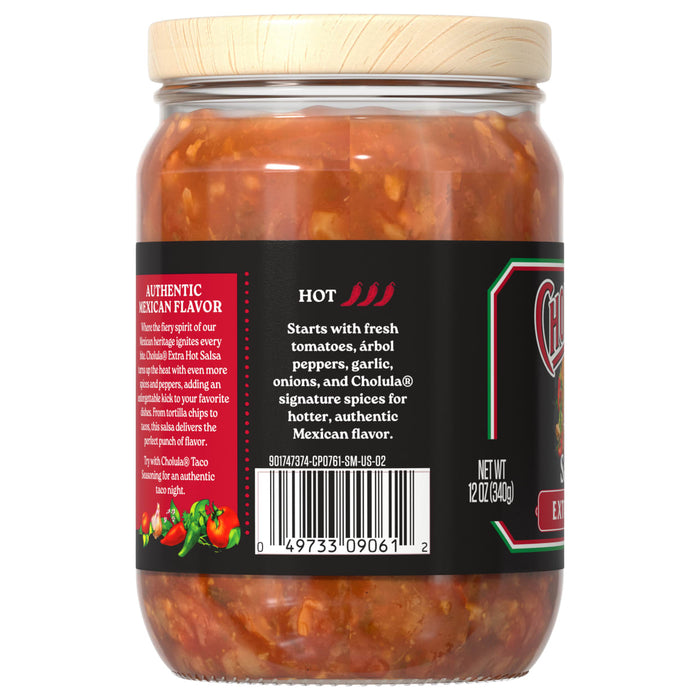 The back label of a glass jar of Cholula Original Hot Red Salsa 12 Oz describes its extra hot spice level and authentic Mexican flavor, listing ingredients like fresh tomatoes and árbol peppers.
