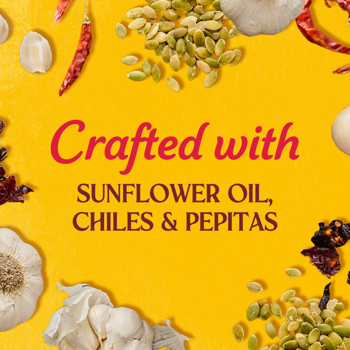 The image showcases the ingredients used in the product including sunflower oil chiles and pepitas set against a vibrant yellow background.