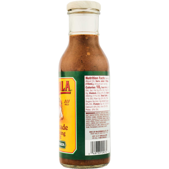 A bottle of Cholula Asada Marinade Cooking Sauce shows the nutrition facts and ingredients.