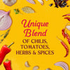 The image showcases a vibrant blend of chilies tomatoes herbs and spices creating a unique culinary composition.
