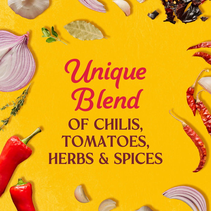 The image showcases a vibrant blend of chilies tomatoes herbs and spices creating a unique culinary composition.
