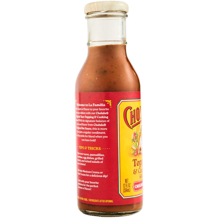 A bottle of Cholula Original Taco Topping &amp; Cooking Sauce.