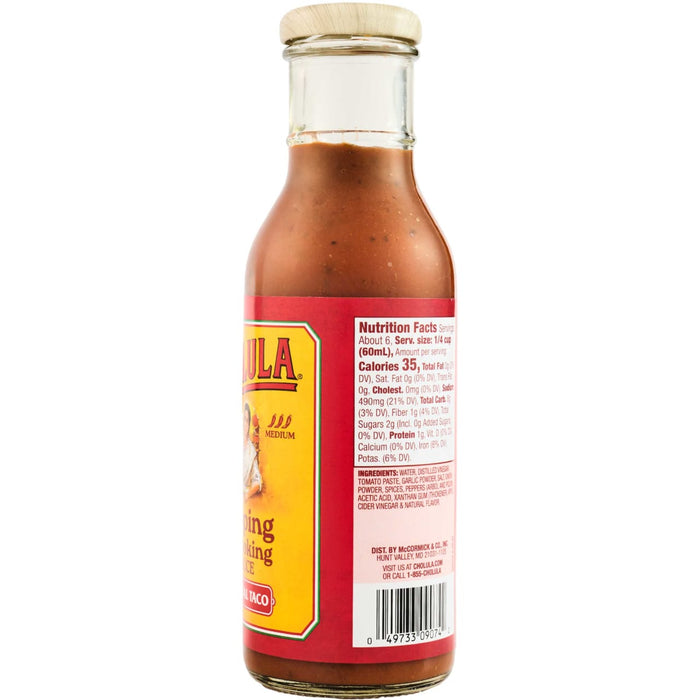 A bottle of Cholula Original Taco Cooking Sauce with nutrition facts and ingredients listed on the label.