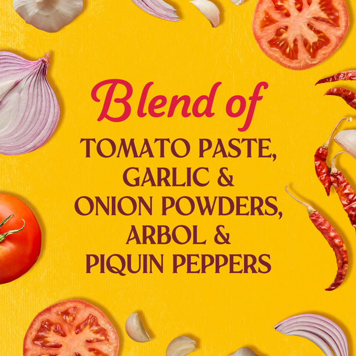 A blend of tomato paste garlic onion powders Arbol and Piquin peppers are displayed on a yellow background with fresh tomatoes onions garlic and dried peppers.