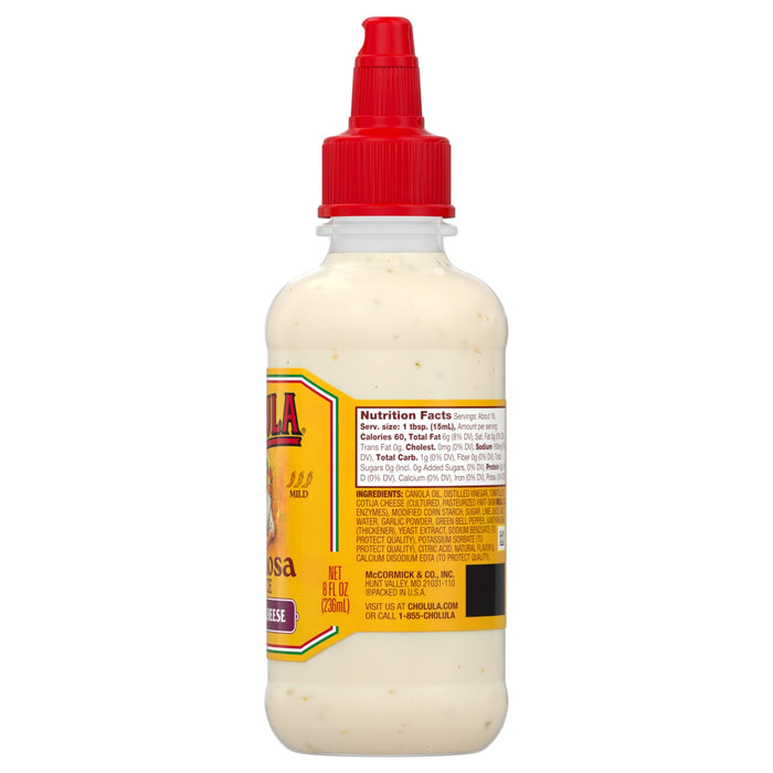 A bottle of Tajin Mild Hot Sauce is shown with its nutritional information visible on the label.