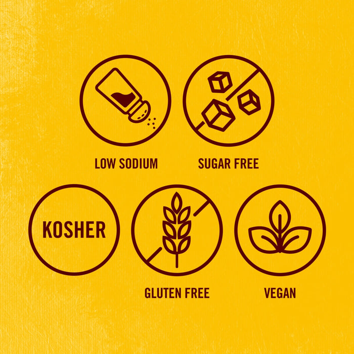 An infographic for Cholula Original Hot Sauce displays five circular icons on a yellow background, indicating low sodium, sugar free, kosher, gluten free, and vegan characteristics.