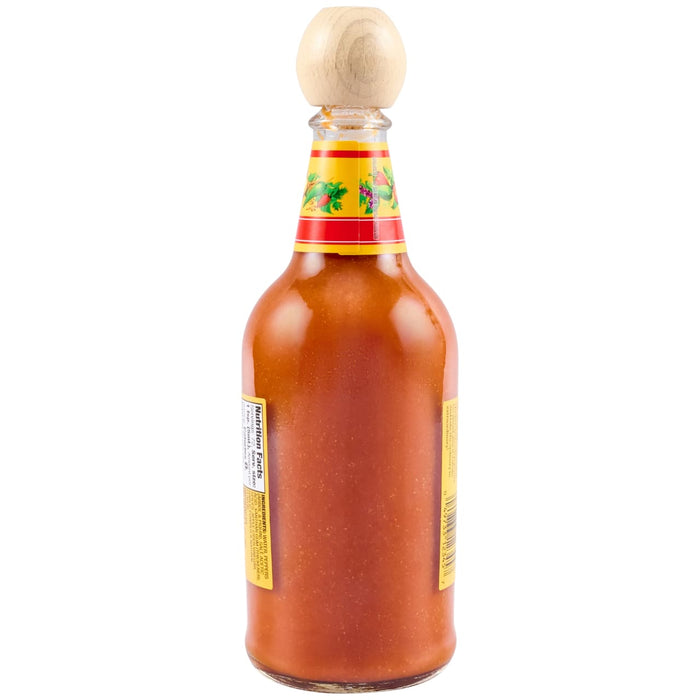 A bottle of Cholula Original Hot Sauce, featuring a distinctive wooden cap and a yellow and red label, stands upright against a white background.