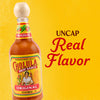 A bottle of Cholula Original Hot Sauce stands on a vibrant yellow background with the text Uncap Real Flavor