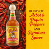 A bottle of Cholula Original Hot Sauce is surrounded by dried red chili peppers, with text describing it as a blend of Arbol &amp; Piquin Peppers and Signature Spices.