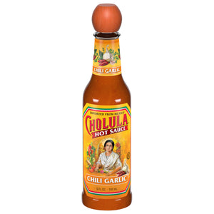 A bottle of Cholula Chili Garlic Hot Sauce.