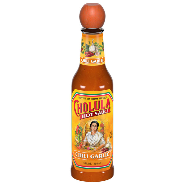 A bottle of Cholula Chili Garlic Hot Sauce.