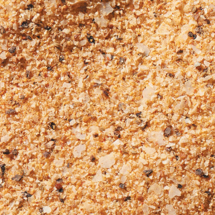 Close up of a mixture of salt, pepper, and other spices.