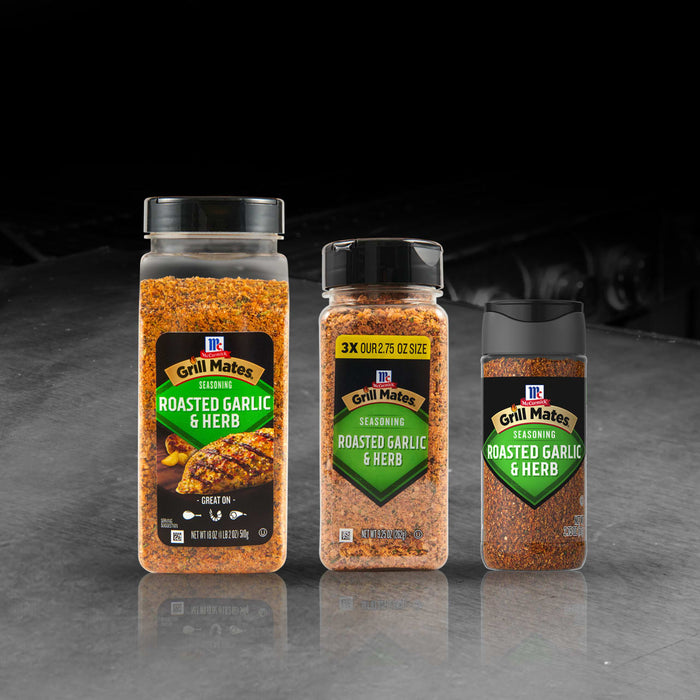 Three sizes of McCormick Grill Mates Roasted Garlic &amp; Herb seasoning are displayed.