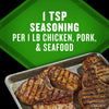This image shows seasoned pork chops on a metal tray with text that reads 1 TSP seasoning per 1 lb chicken, pork, &amp; seafood.