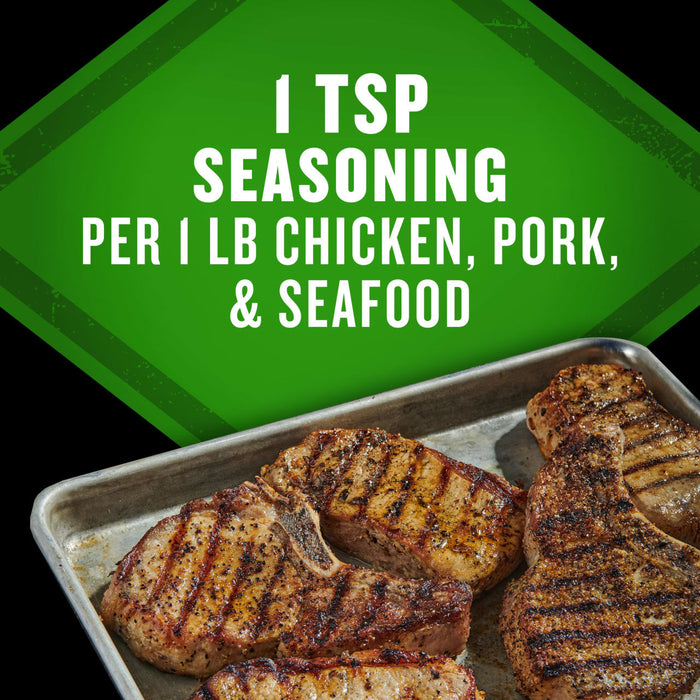 This image shows seasoned pork chops on a metal tray with text that reads 1 TSP seasoning per 1 lb chicken, pork, &amp; seafood.