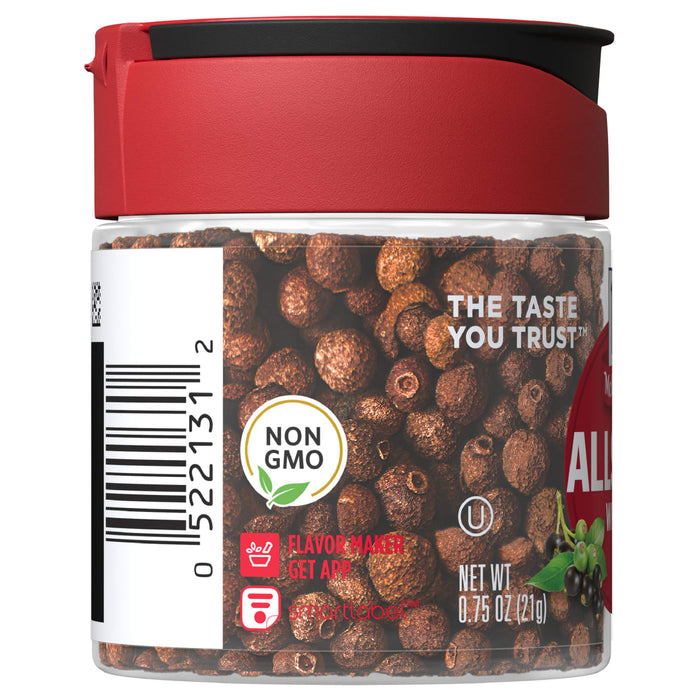 A jar of McCormick Allspice Berries with a red lid and a white label with the words The Taste You Trust and Non GMO on it.
