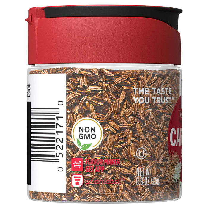 A jar of McCormick Caraway Seeds with a red lid and a white label.