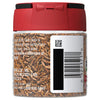 A glass jar of McCormick Caraway Seeds with a red lid.