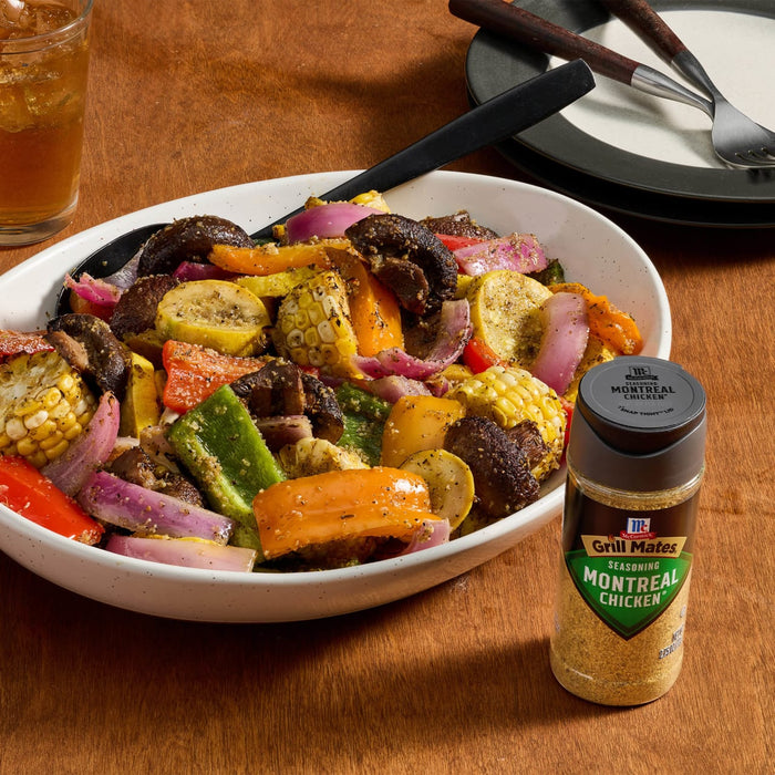 A bowl of grilled vegetables with McCormick Montreal Steak Spice seasoning.