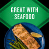 A plate of salmon with asparagus and a lemon wedge is shown with the text Great with Seafood in a green banner.