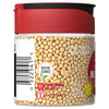 A jar of yellow mustard seeds with a red lid and a label that says The taste you trust and Non GMO.