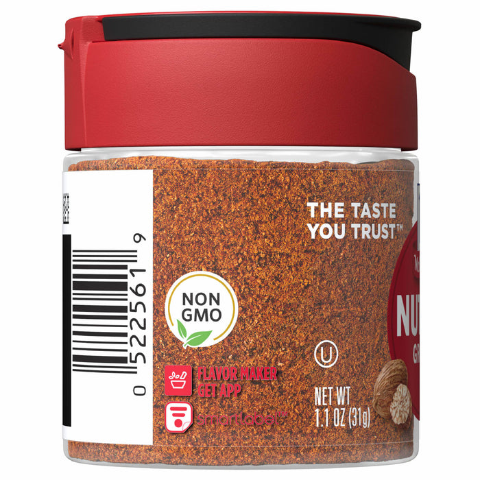A glass jar of McCormick Ground Nutmeg.