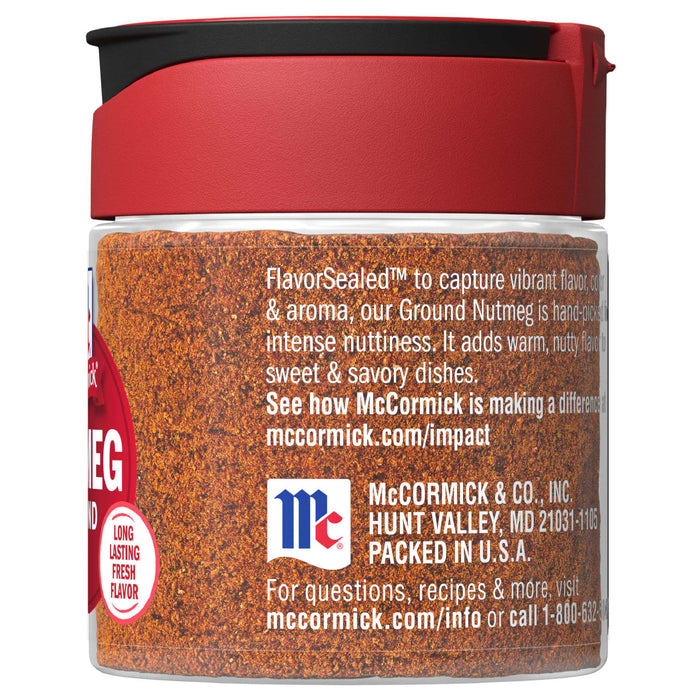 A glass jar of McCormick Ground Nutmeg.