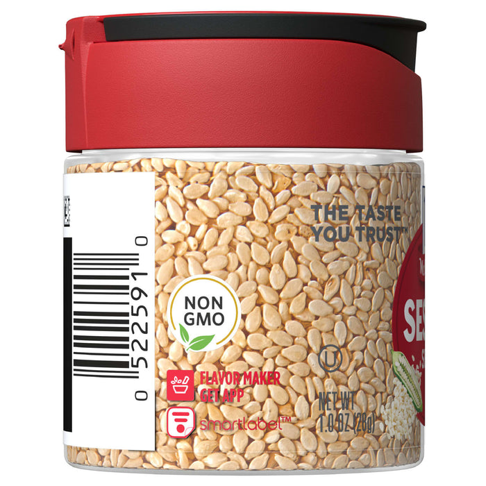 A jar of McCormick Sesame Seeds with a red lid and a white label with the words The Taste You Trust and Non GMO on it.