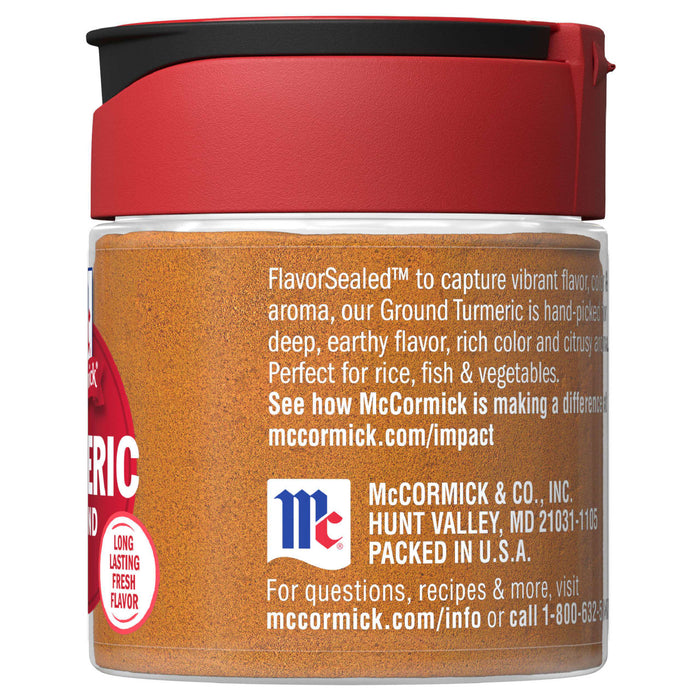 A jar of McCormick Ground Turmeric with a red lid.