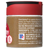 A McCormick Poultry Seasoning jar with a red lid and a label with the ingredients listed.