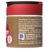 A McCormick Poultry Seasoning jar with a red lid and a label with the ingredients listed.