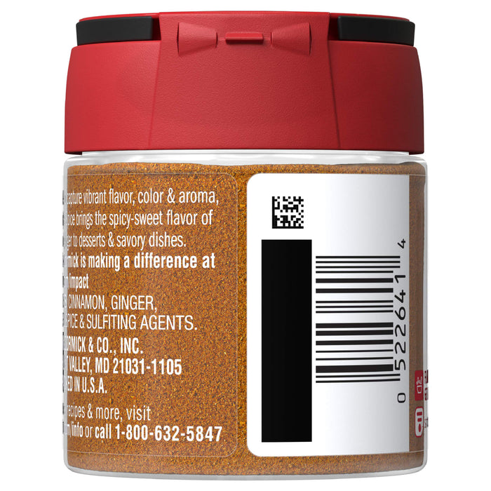 A jar of Mccormick Pumpkin Pie Spice, with a red cap and a label showing ingredients like cinnamon and ginger, company details, and a barcode.