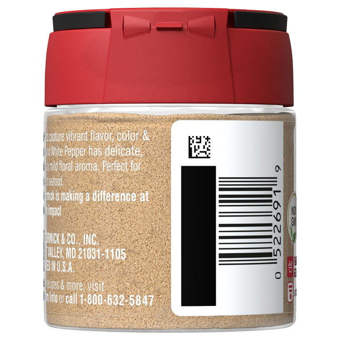 A McCormick White Pepper spice jar with a barcode and a non-GMO label.