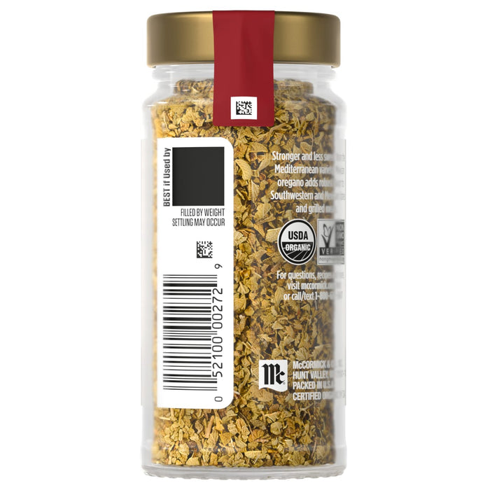 A jar of McCormick organic granulated garlic with a barcode and product information label.