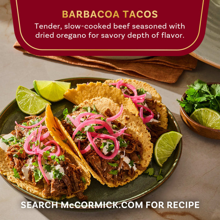 McCormick Barbacoa Tacos featuring tender, slow-cooked beef seasoned with dried oregano, garnished with lime and cilantro.