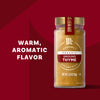 A jar of McCormick Gourmet Ground Thyme is displayed with the text Warm, Aromatic Flavor.