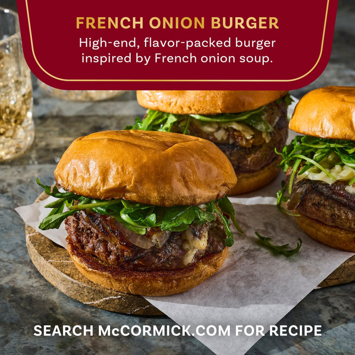 McCormick's French Onion Burger, a high-end, flavor-packed burger inspired by French onion soup, is shown on a wooden board.