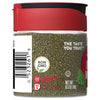 A glass jar of McCormick Dill Weed seasoning with a red lid.