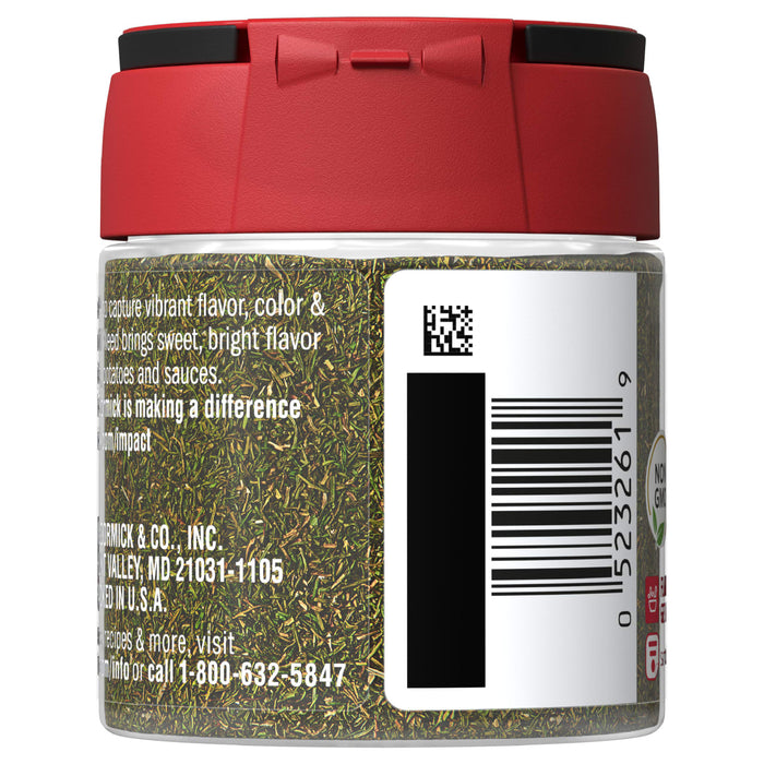 A glass jar of McCormick Dill Weed with a red lid.