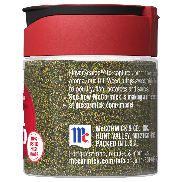 A McCormick Dill Weed spice jar with a red lid.