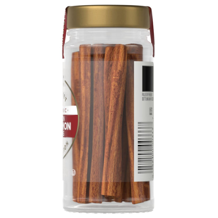 A jar of Simply Organic cinnamon sticks is shown, highlighting the product's natural and organic qualities.