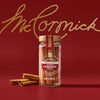 A jar of McCormick cinnamon sticks is displayed against a red background with the McCormick logo.