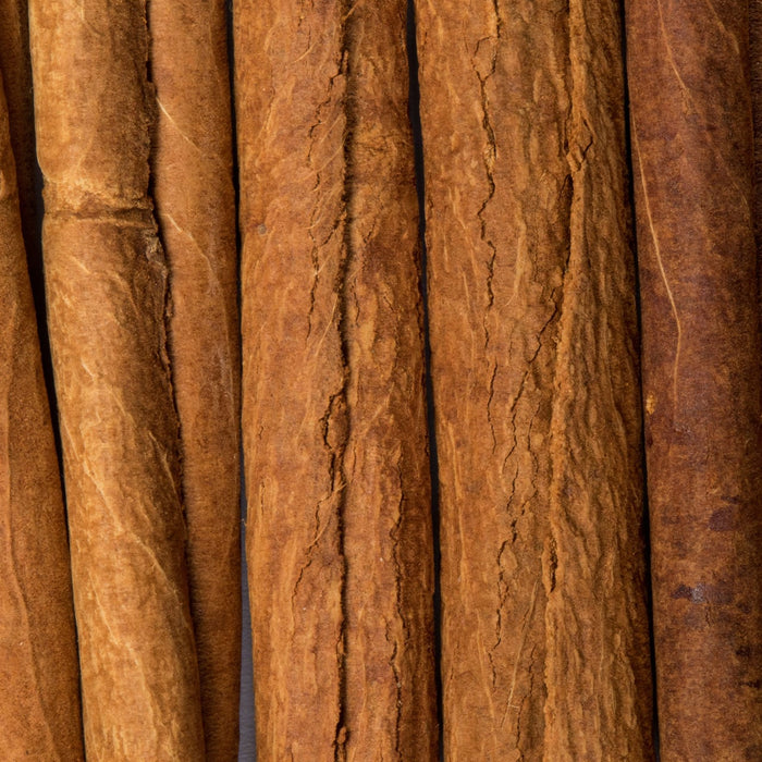 A close-up of cinnamon sticks showcasing their texture and warm color.